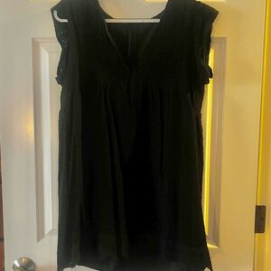 Black eyelet romper with pockets